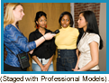 Radio reporter interviewing two young African-American and one Asian girls. (Staged with professional models).